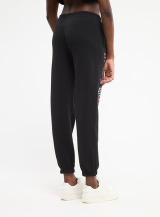 Pantaloni tuta vita alta scritte stile graffiti