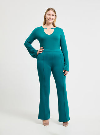 Pantaloni a zampa tinta unita