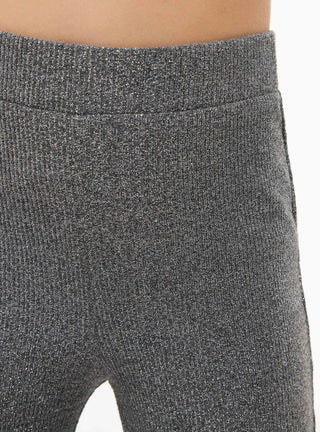 Glitzernde ausgestellte Leggings