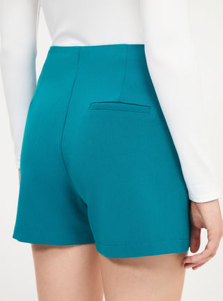 Shorts tinta unita con bottoni applicati