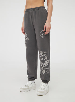 Pantaloni tuta vita alta scritte stile graffiti