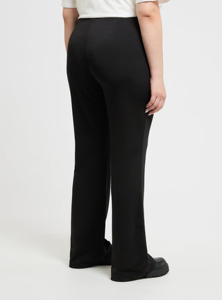 Pantaloni a zampa tinta unita