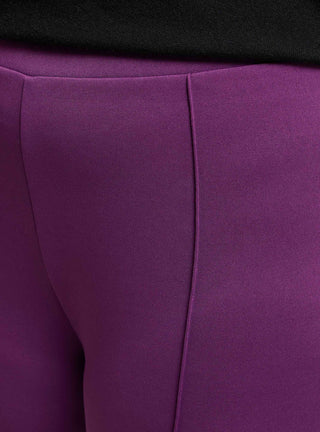 Pantaloni a zampa tinta unita