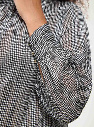 Blusa con colletto arricciato