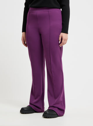 Pantaloni a zampa tinta unita