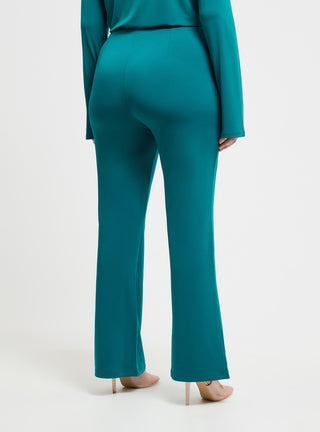 Pantaloni a zampa tinta unita