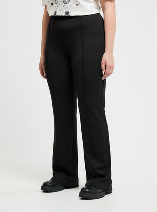 Pantaloni a zampa tinta unita