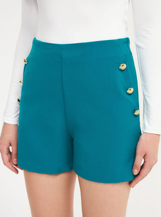 Shorts tinta unita con bottoni applicati