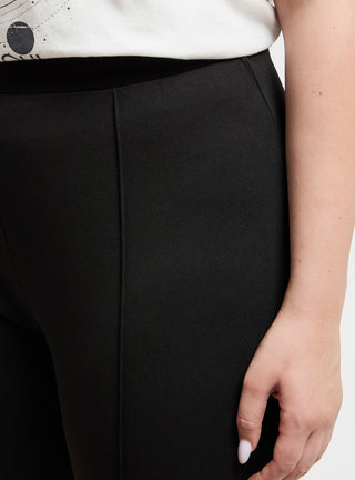 Pantaloni a zampa tinta unita