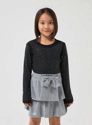 Gonna luccicante a balze