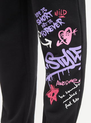 Pantaloni tuta vita alta scritte stile graffiti