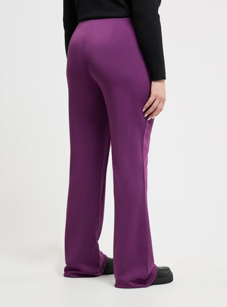 Pantaloni a zampa tinta unita