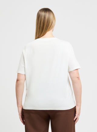 T-shirt ampia con stampa e applicazione